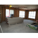 Sheetrock stacked up as workers prepare to dry in the rooms