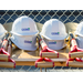 Ceremony hard hats and shovels on table